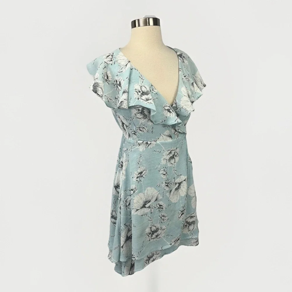 Free People French Quarter Wrap Dress Sz Small Blue White Floral Ruffle Mini